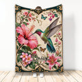 Hummingbird throw blanket with tropical flowers, butterflies, ornate borders, and colorful bird artwork
