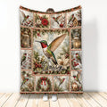 Christmas hummingbird blanket featuring colorful birds, holly, poinsettias, wreaths, and winter decor