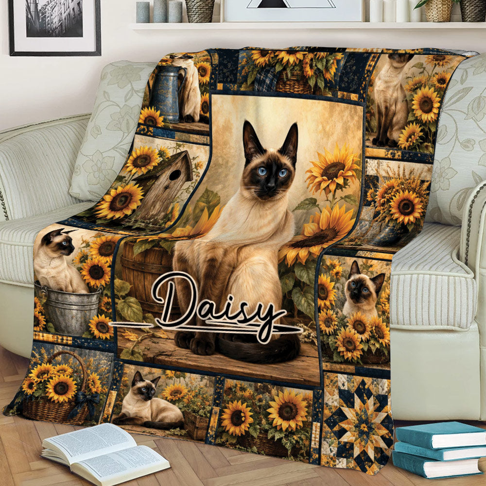Siamese cat blanket displayed on a sofa with sunflowers, country scenes, and warm colors