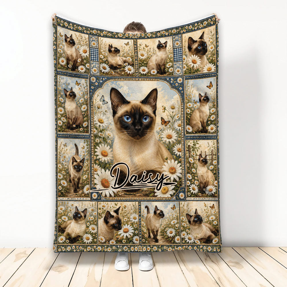 Siamese cat blanket displayed upright with blue-eyed cats, daisies, butterflies, and vintage botanical panels