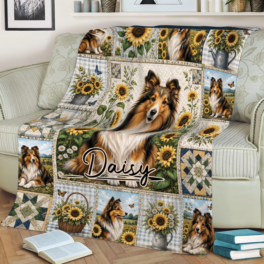 Close view of a Sheltie throw blanket on a sofa with sunflowers, butterflies, and scenic dog artwork