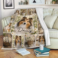 Sheltie blanket displayed on a sofa with floral collage artwork, daisies, and several realistic Sheltie portraits