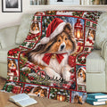 Holiday Sheltie blanket spread across a couch, featuring a Santa-hat dog, ornaments, gifts, and lanterns