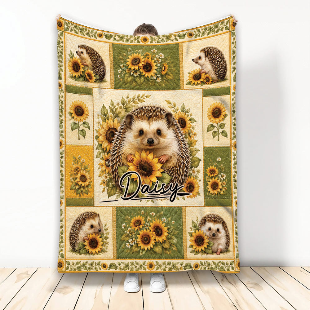 Hedgehog and sunflower throw blanket displayed upright with a warm botanical design