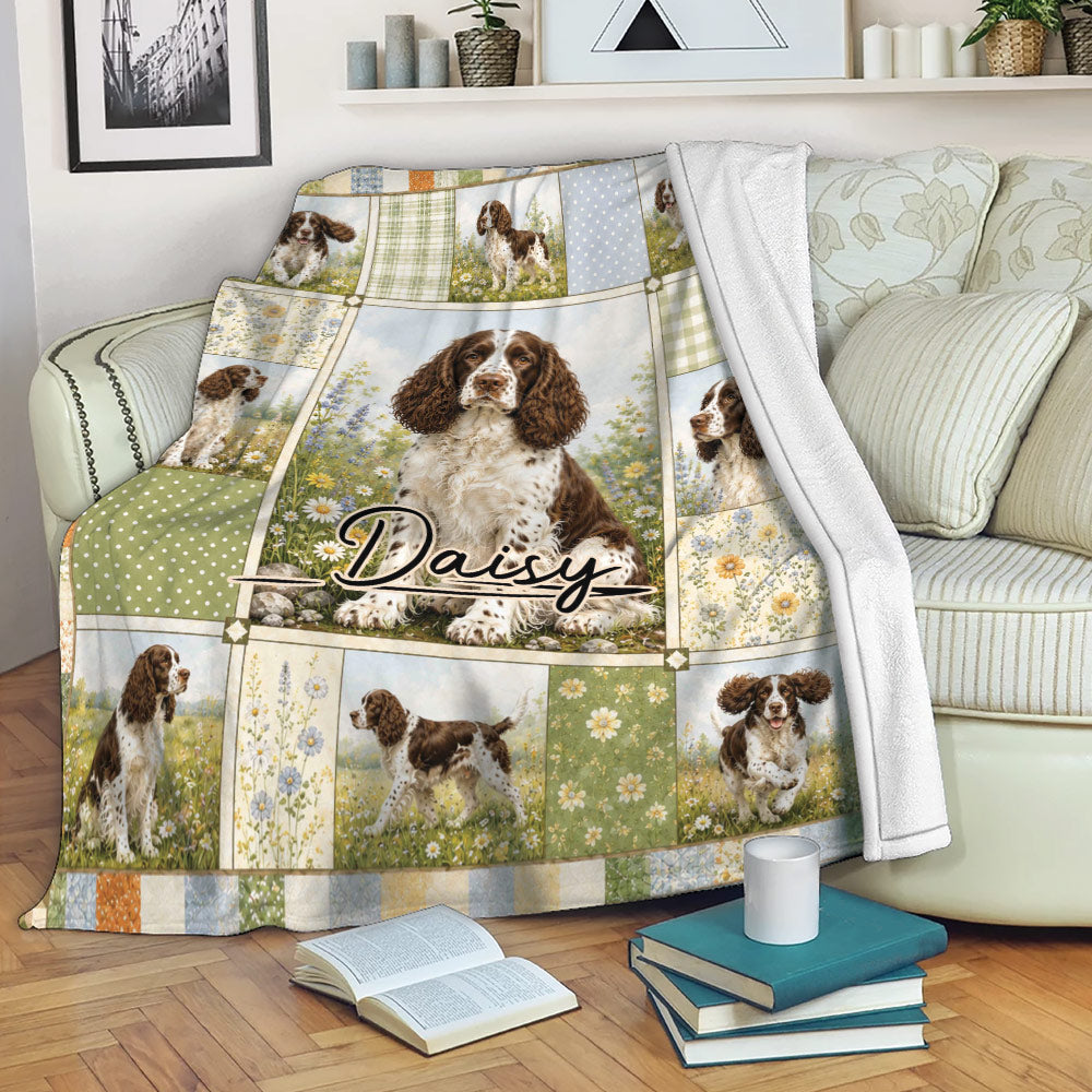English Springer Spaniel blanket displayed on a sofa with floral panels and countryside dog scenes