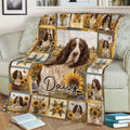 English Springer Spaniel blanket displayed on a couch with sunflower accents and country-style artwork