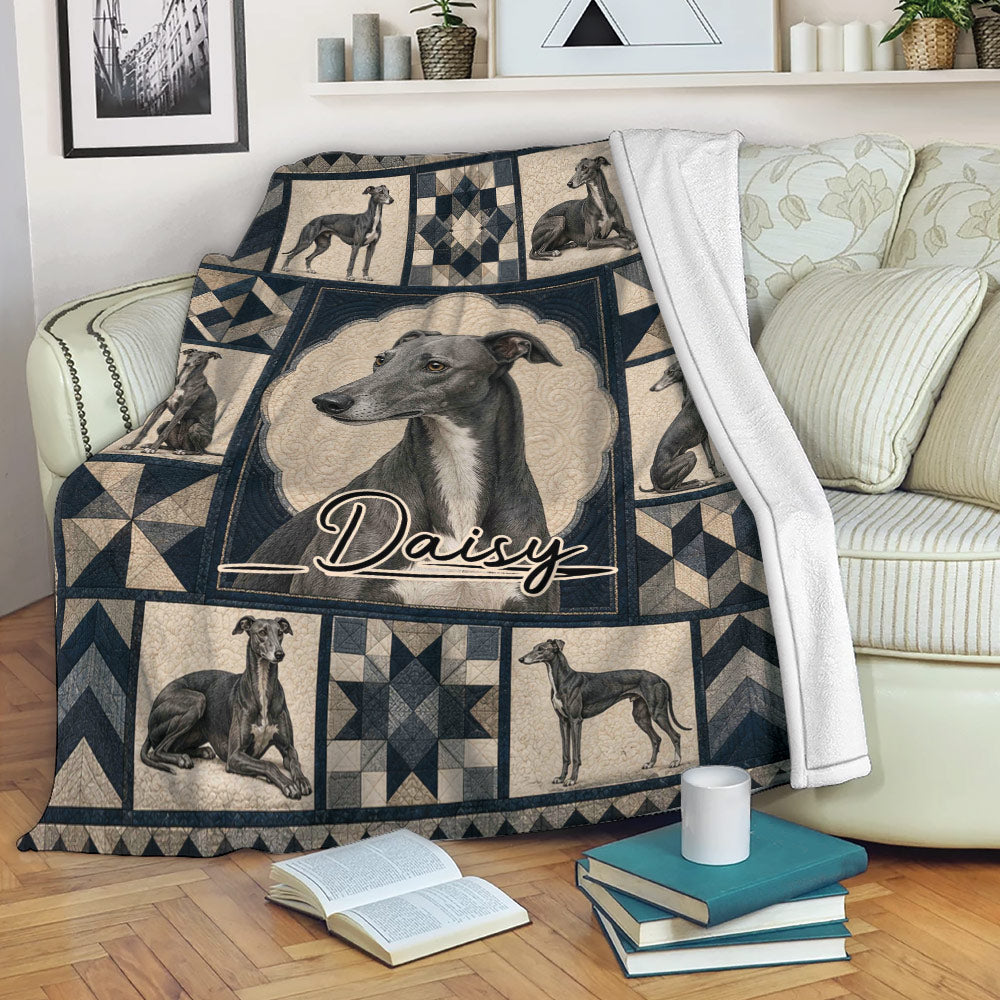 Greyhound blanket styled on a sofa with detailed dog portraits and dark geometric decorative panels