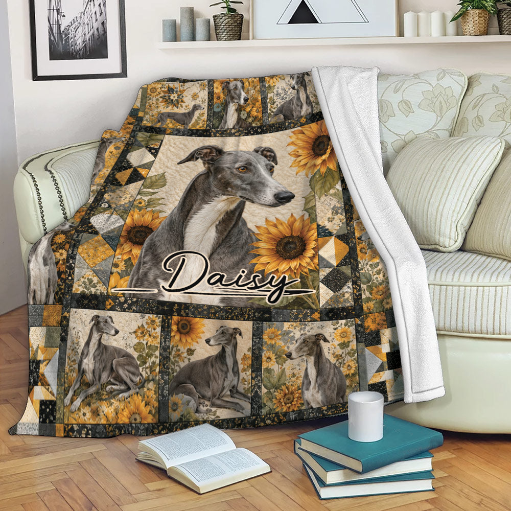 Greyhound blanket draped over a sofa with sunflower artwork and warm rustic floral accents