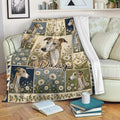 Floral Greyhound throw blanket draped over a sofa in a cozy living room setting