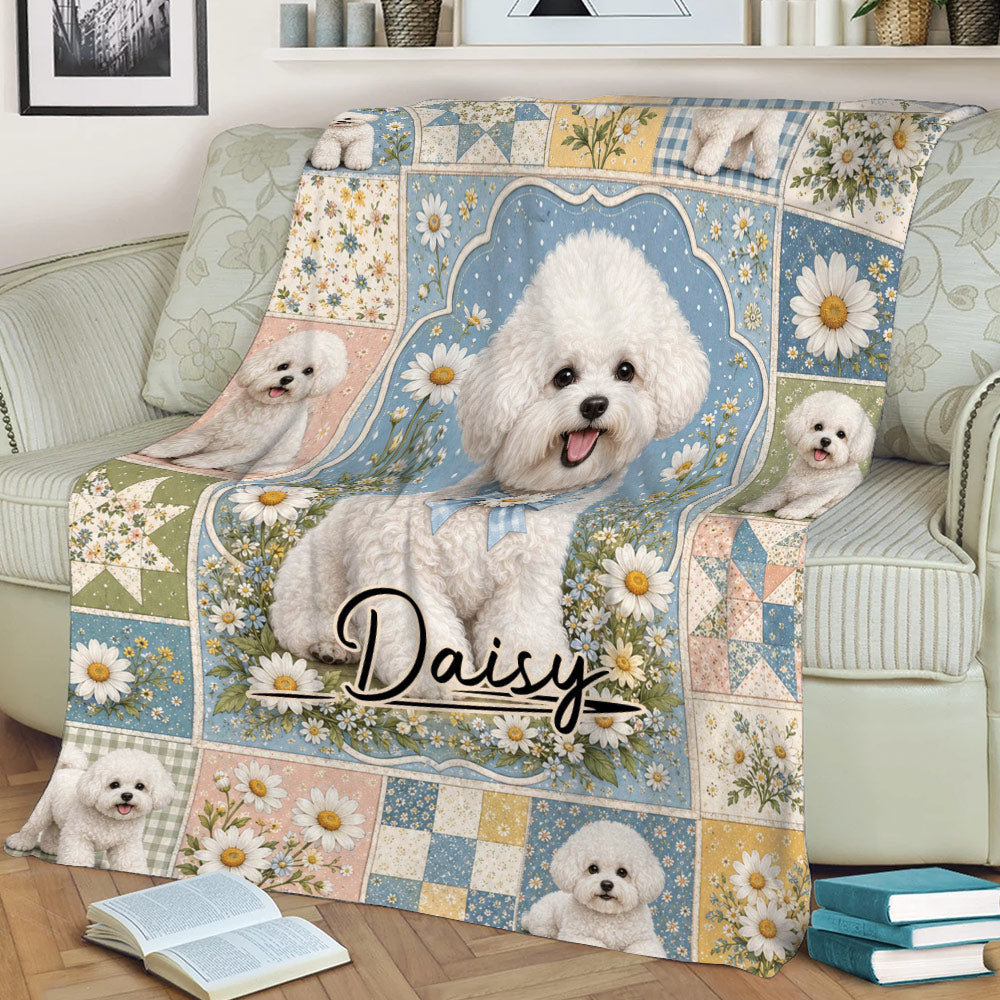 Floral Bichon Frise blanket draped over a couch with white curly dog artwork and blue accents