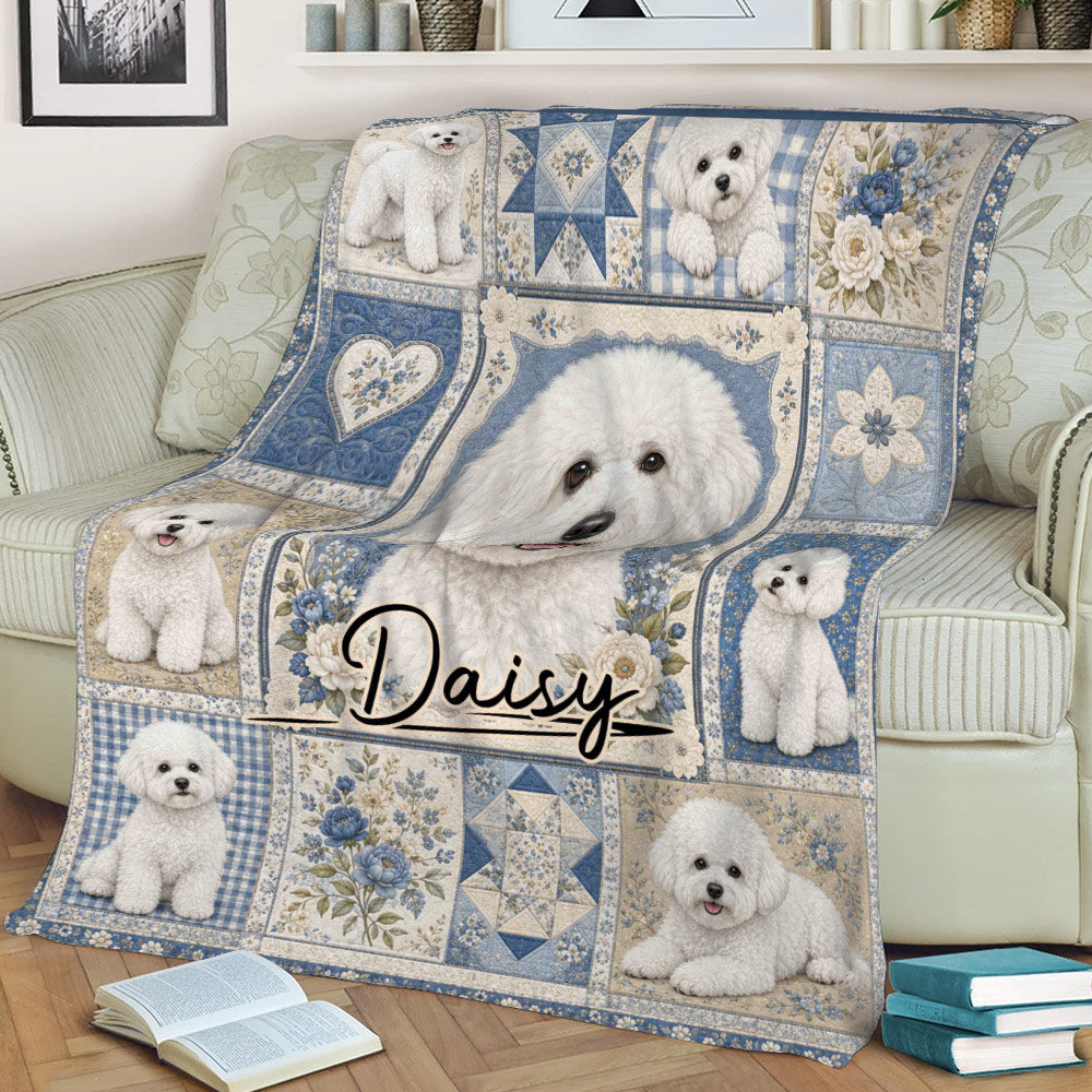 Bichon Frise blanket displayed on a sofa, featuring a large fluffy white dog and coordinated blue floral panels