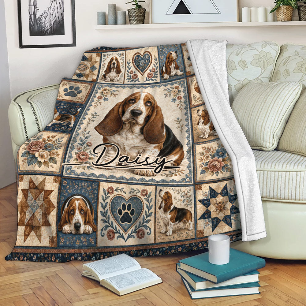Basset Hound blanket draped over a sofa with vintage floral panels, paw motifs, and cozy living room styling