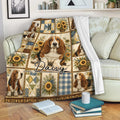 Basset Hound throw blanket displayed on a sofa with rustic quilt-style panels and sunflowers