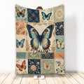 Butterfly throw blanket with vintage floral patchwork artwork in blue, teal, cream, and coral tones