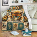 Butterfly and sunflower throw blanket styled on a living room sofa