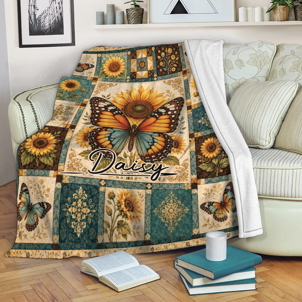 Butterfly and sunflower throw blanket styled on a living room sofa