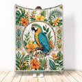 Colorful parrot blanket with tropical flowers, palm leaves, and decorative botanical panels
