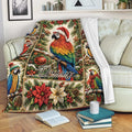 Christmas parrot throw blanket draped over a sofa with colorful macaws, ornaments, and holiday greenery