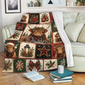 Christmas Highland Cow throw blanket draped over a sofa with festive patchwork artwork