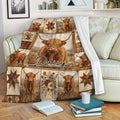 Highland Cow Blanket Draped Over a Sofa with Rustic Farmhouse Artwork