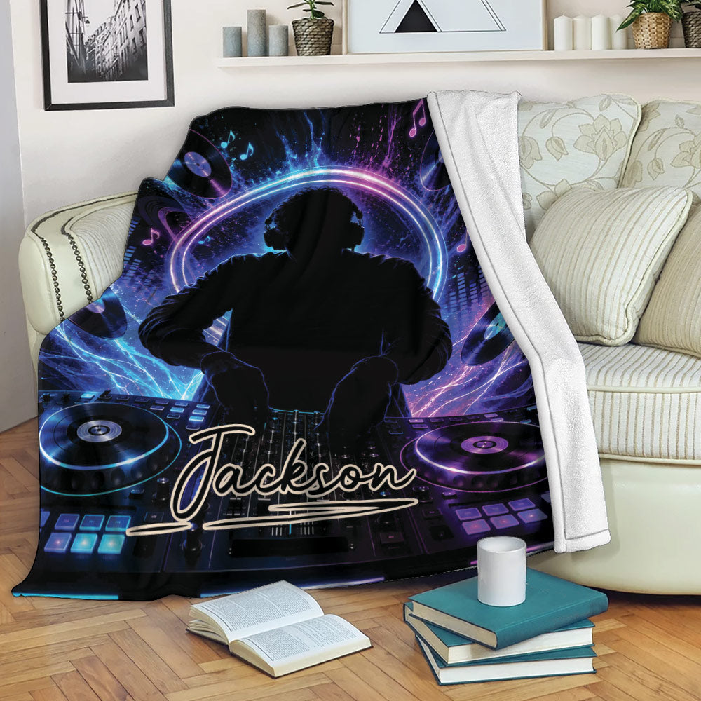 DJ throw blanket draped over a sofa with colorful neon turntables, music notes, and mixing console artwork