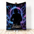 DJ blanket with neon music artwork, turntables, headphones, and a silhouetted DJ mixing at a console