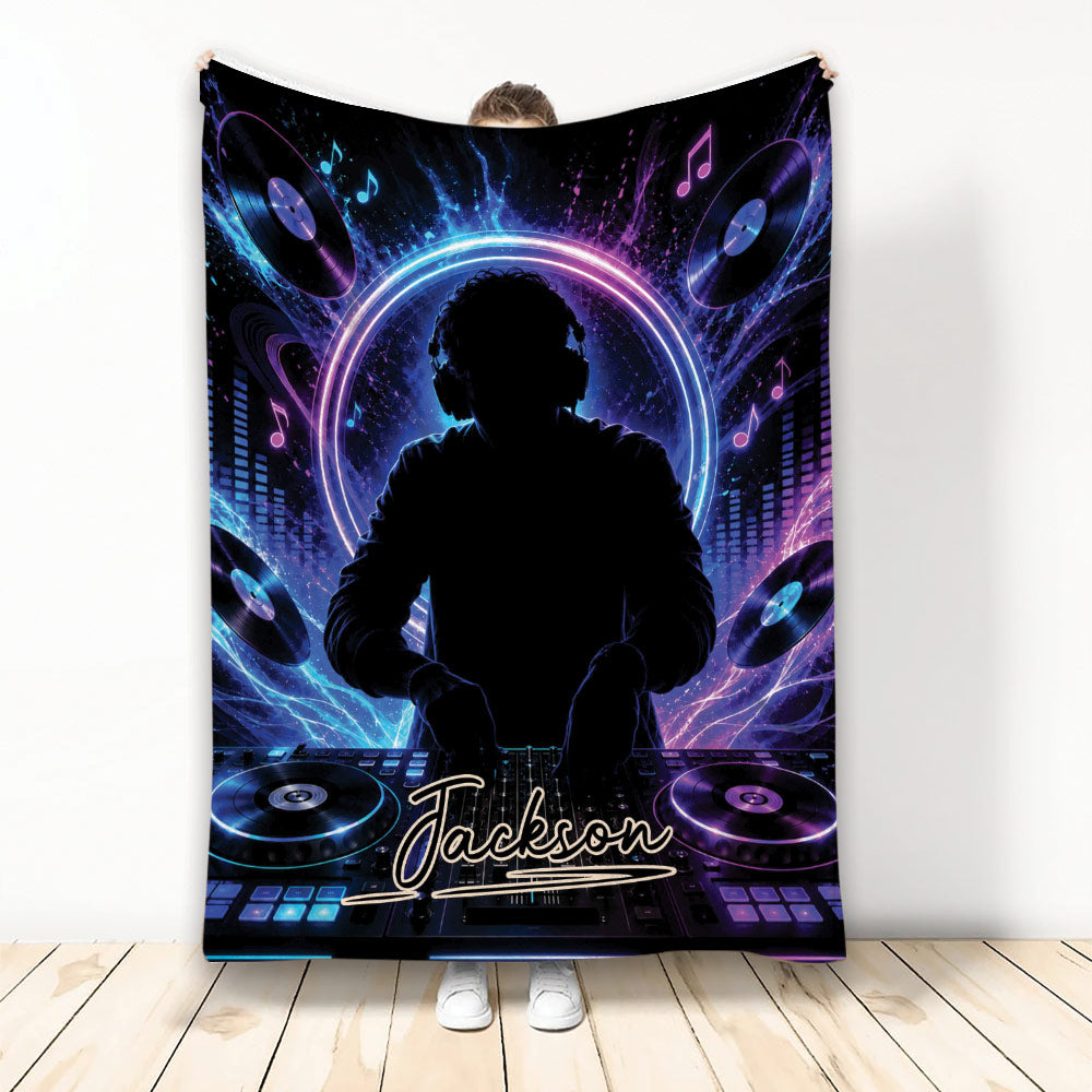 DJ blanket with neon music artwork, turntables, headphones, and a silhouetted DJ mixing at a console