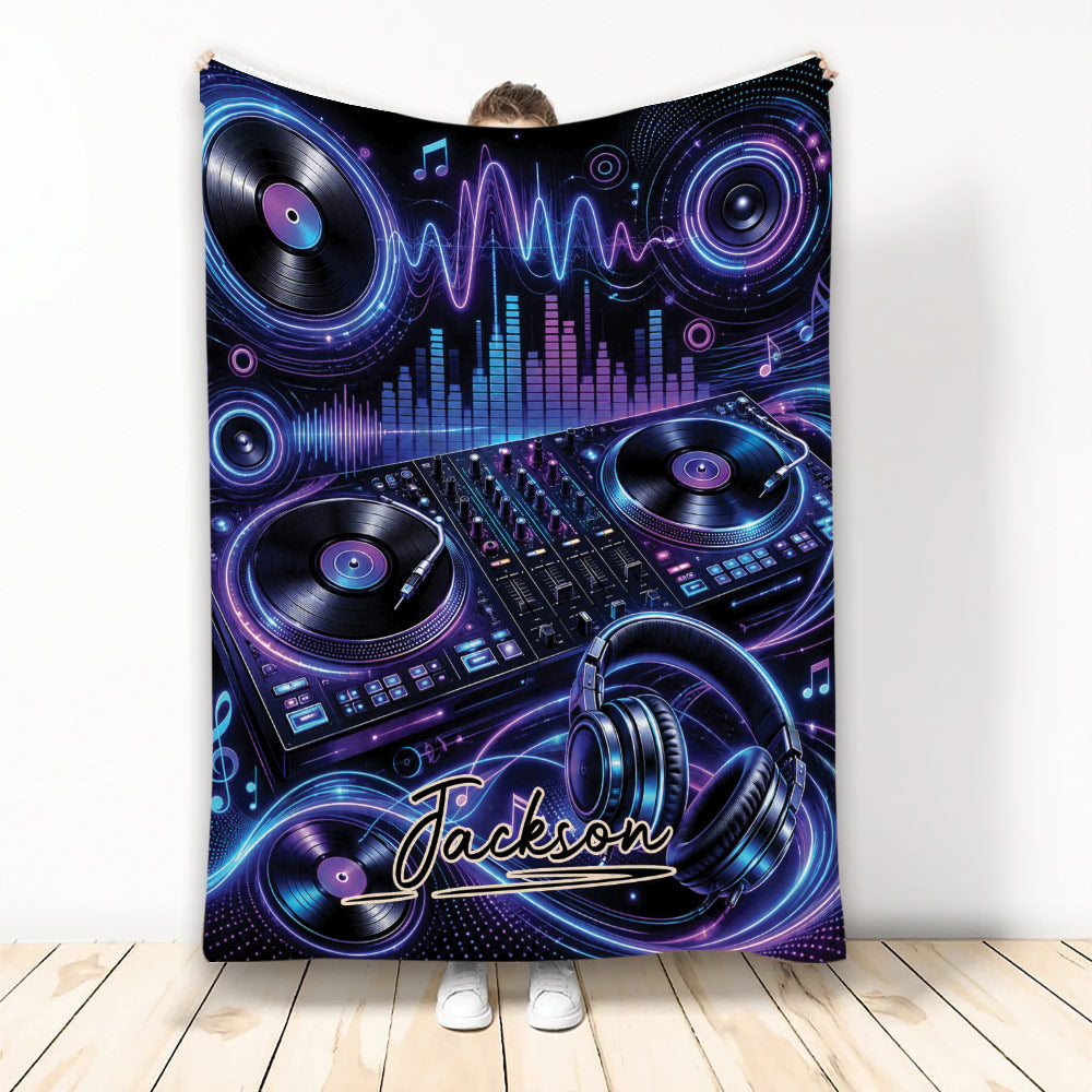 DJ throw blanket featuring turntables, headphones, sound waves, equalizer bars, and neon music artwork