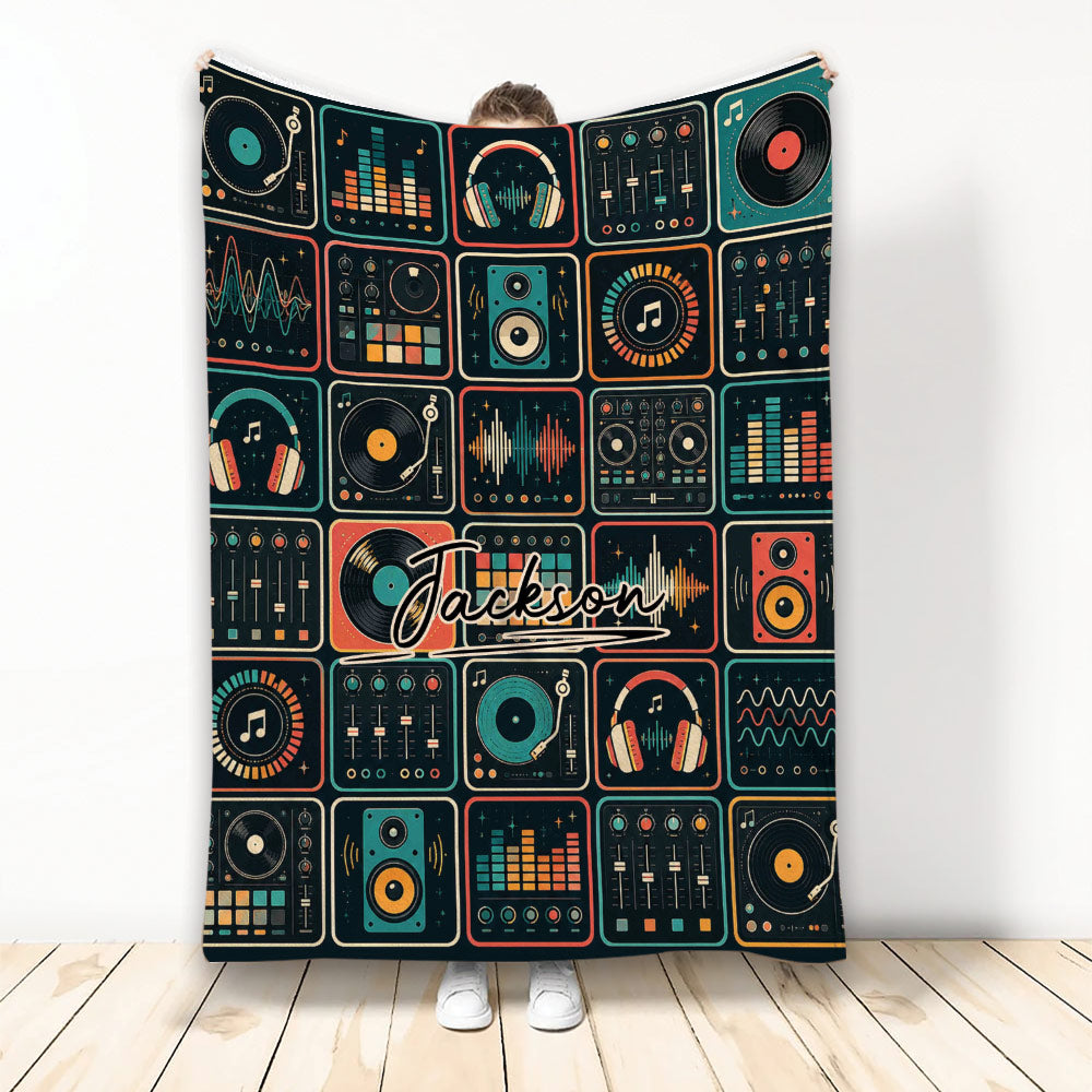 DJ throw blanket displayed upright with colorful turntables, mixers, headphones, speakers, and music graphics