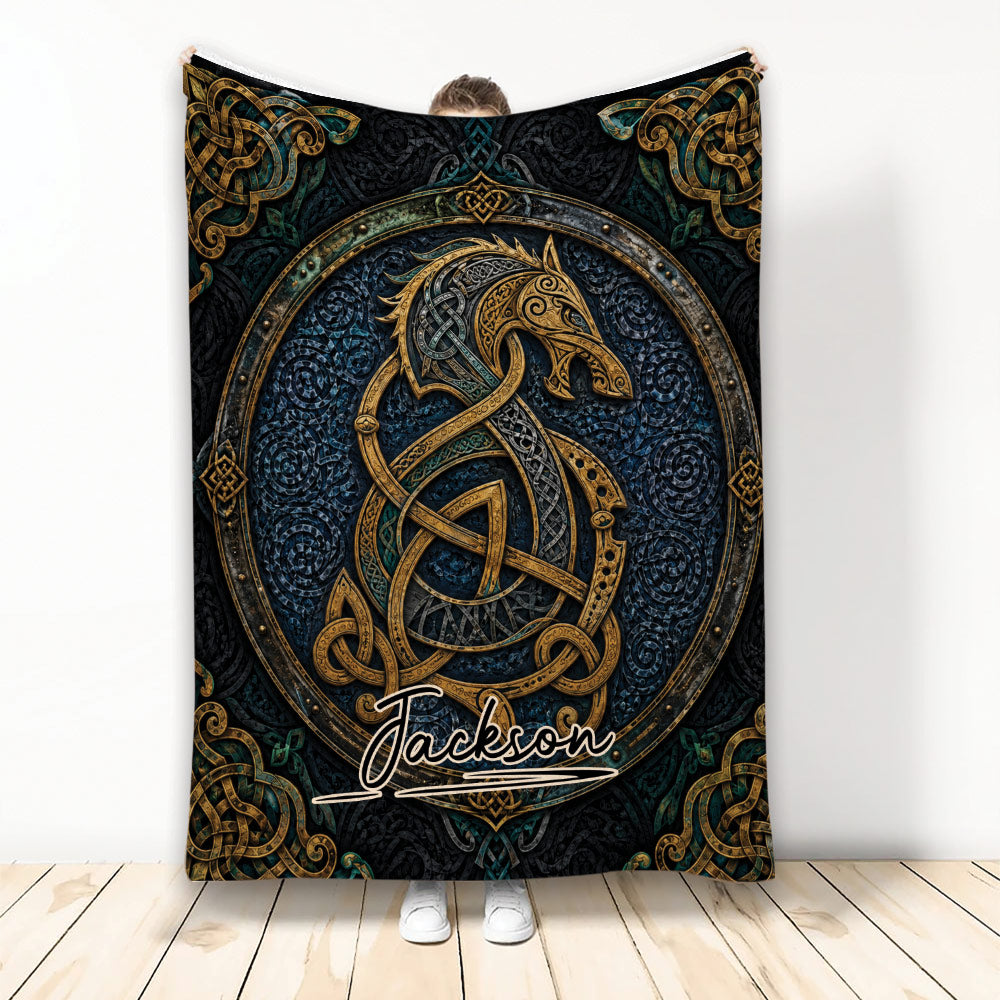 Viking throw blanket featuring ornate Norse knotwork, a mythical creature emblem, and dark blue and gold artwork