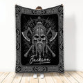 Black and white Viking blanket featuring a bearded warrior skull, horned helmet, crossed axes, and Norse knotwork