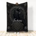Viking blanket with a black raven, Norse-inspired symbols, shields, and ornate dark knotwork
