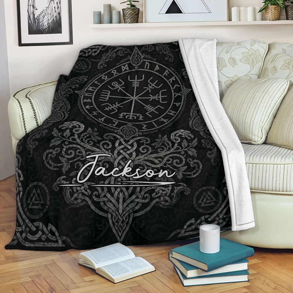 Viking throw blanket draped over a sofa with Nordic runes and ornate knotwork design