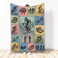 Bicycle throw blanket displayed upright with vintage cycling artwork, bicycles, helmets, shoes, and riders