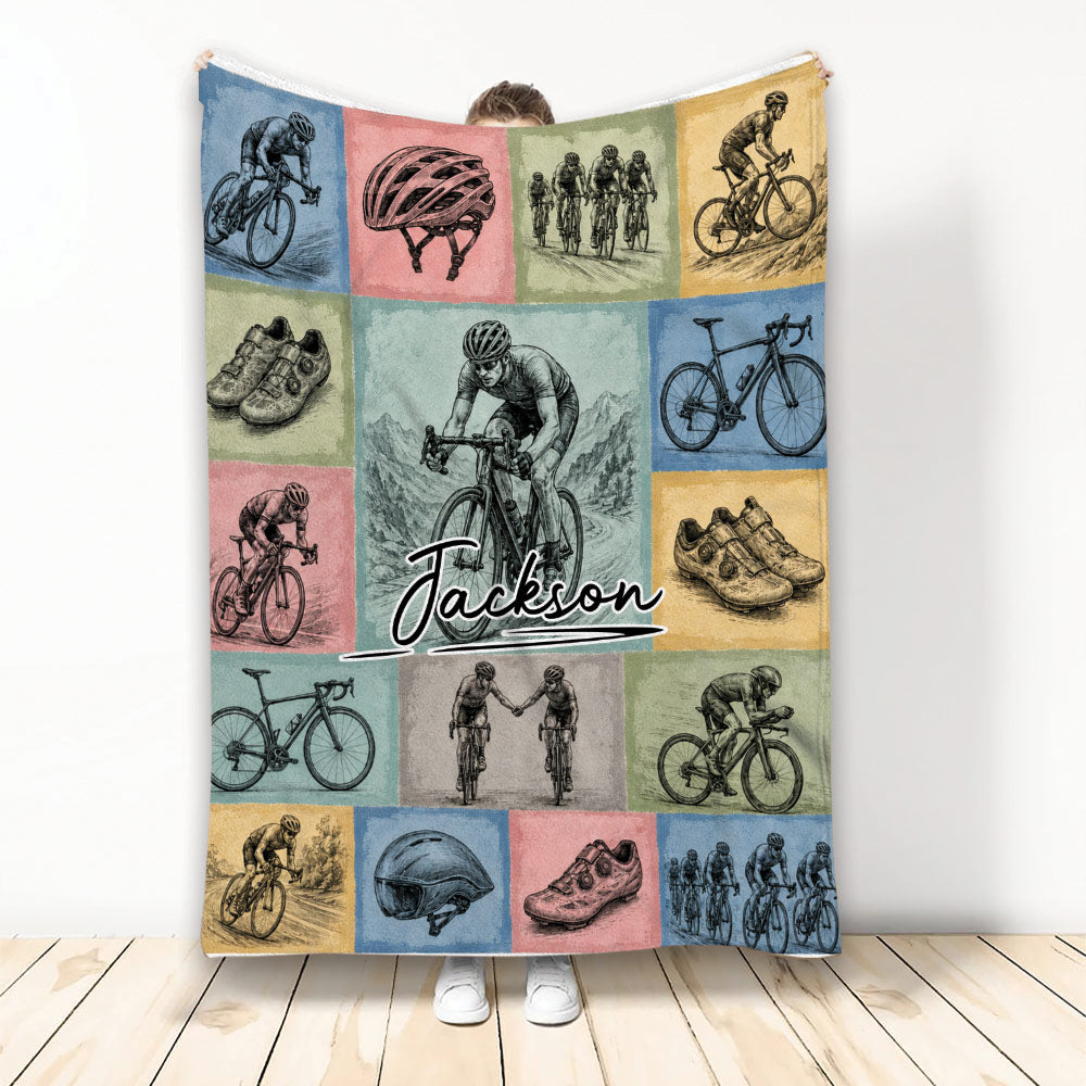 Bicycle throw blanket displayed upright with vintage cycling artwork, bicycles, helmets, shoes, and riders