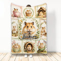 Hamster throw blanket with floral collage artwork and multiple cute hamsters in cozy illustrated scenes