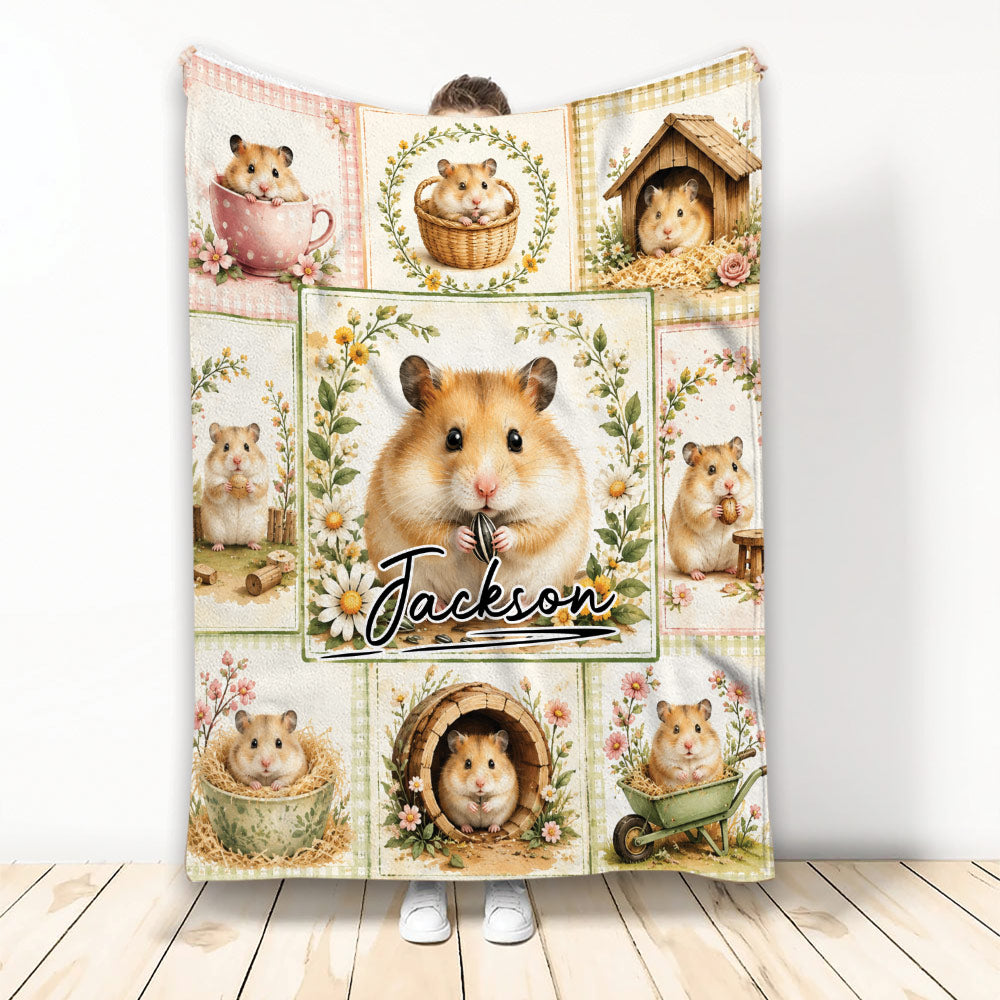 Hamster throw blanket with floral collage artwork and multiple cute hamsters in cozy illustrated scenes