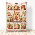 Hamster blanket with strawberry-themed artwork, floral accents, and a central hamster design