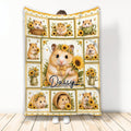 Hamster throw blanket featuring sunflower scenes, multiple cute hamsters, and a warm country-style patchwork design