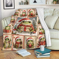 Festive frog throw blanket draped over a sofa with Christmas frogs, presents, and holiday decorations