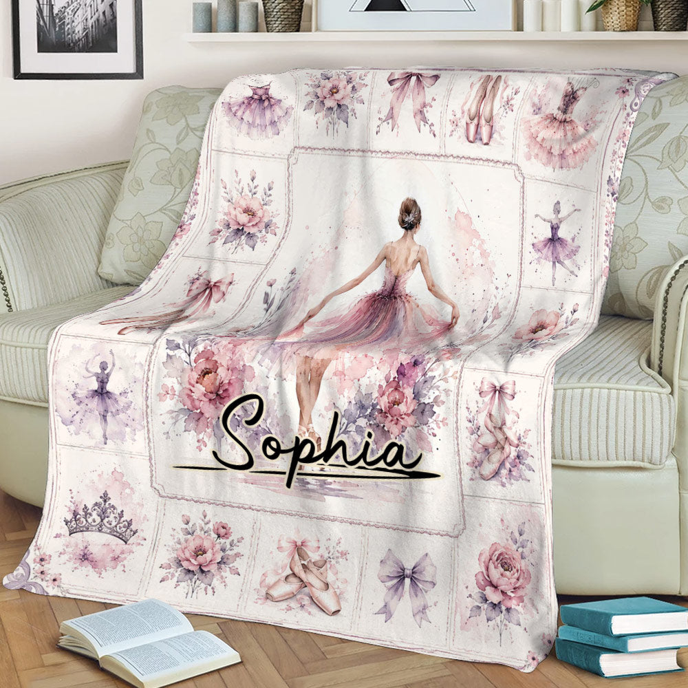 Pastel ballerina throw blanket displayed on a sofa with pointe shoes and floral ballet artwork