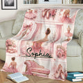 Ballet throw blanket displayed on a sofa with pink dancers, pointe shoes, roses, and romantic decor
