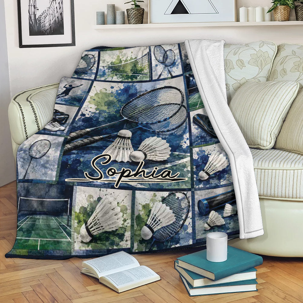 Badminton blanket draped over a sofa, featuring racket and shuttlecock collage artwork