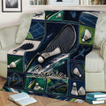 Badminton throw blanket draped across a sofa with detailed racket, shuttlecock, court, and sports bag artwork