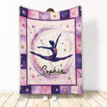 Gymnastics throw blanket featuring a leaping gymnast surrounded by pink, purple, gold, and star artwork