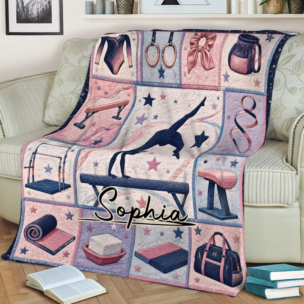 Gymnastics throw blanket displayed on a couch with gymnast silhouette, beam, rings, vault, and rhythmic ribbon artwork