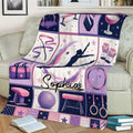 Colorful gymnastics blanket draped over a sofa with gymnast silhouette and star details