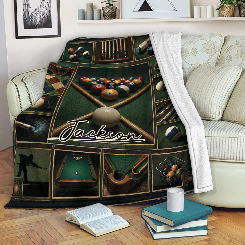 Billiard throw blanket draped over a sofa with pool balls, cues, and green felt table artwork