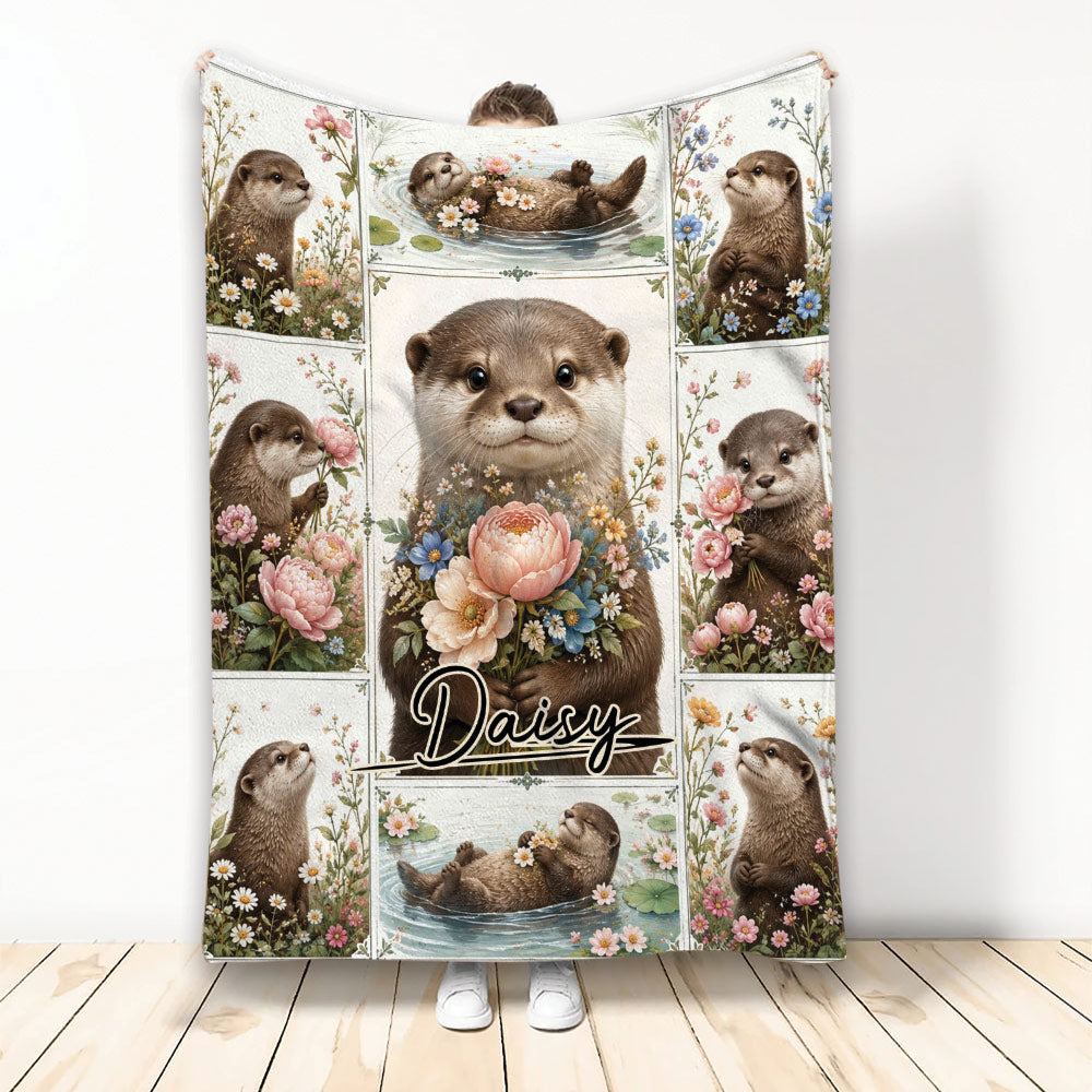Otter throw blanket with floral panels, pond scenes, and wildlife artwork displayed upright