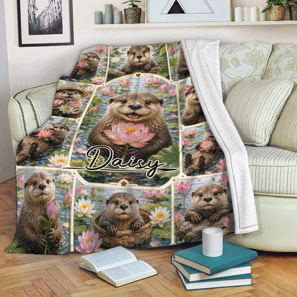 Otter blanket draped over a sofa with aquatic wildlife artwork and colorful water lily details